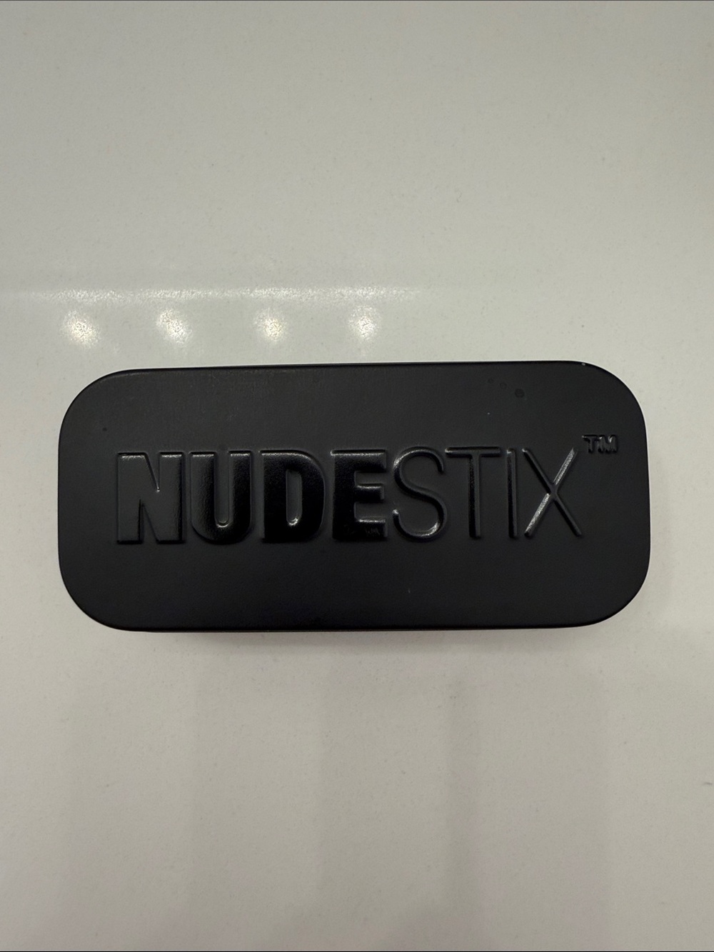 NUDESTIX Black Embossed Logo Tin Case